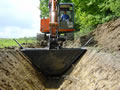 Groundworks, trenches, drainage and land clearance with heavy plant machinery from Curling Contractors covering Surrey, Essex, Kent and Southeast England