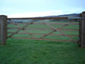 Gates, timber, cattle fencing, posts to keep animals confined by Curling Contractors Surrey, Buckinghamshire and Hertfordshire